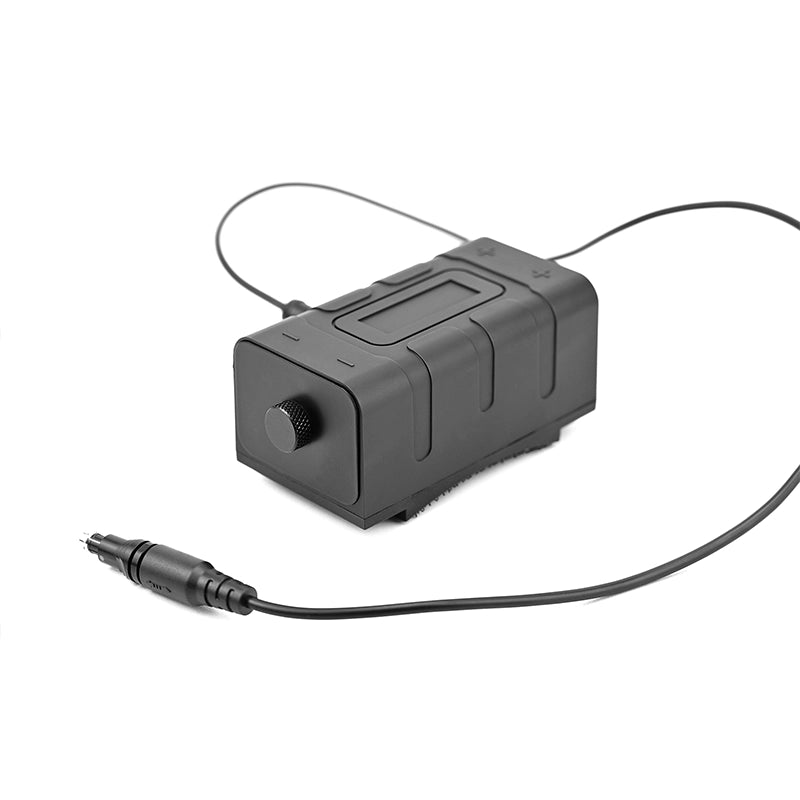 Black electronic device with a cable on a white background night vision battery pack