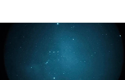 Starry night sky with a dark blue gradient