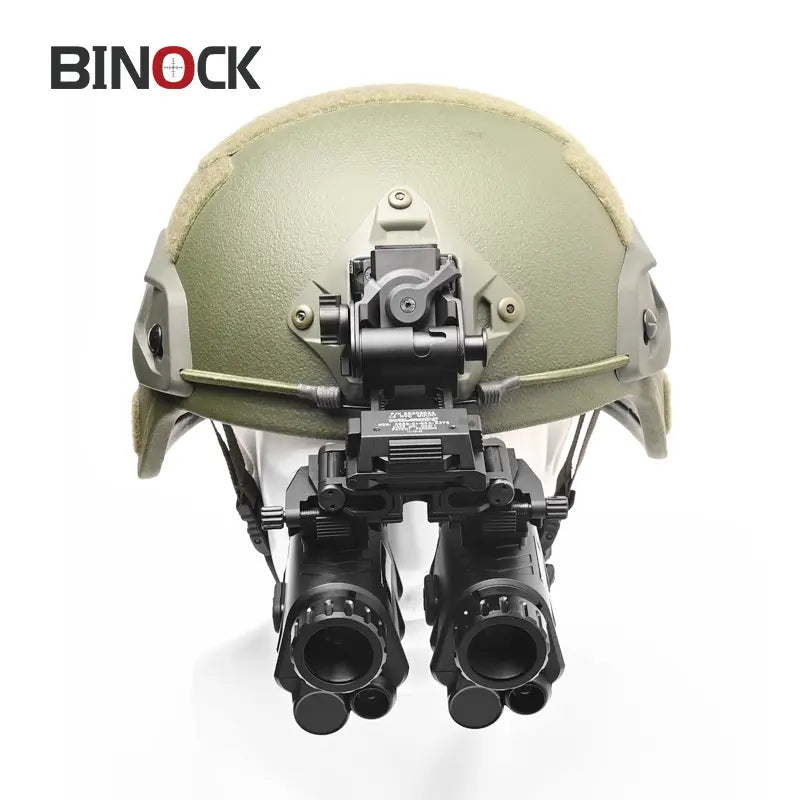 Green military helmet with binoculars and scope attachments on a white background, featuring the BINOCK brand.