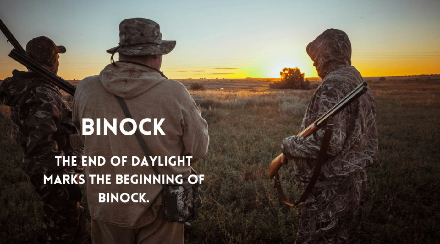 Three people in hunting gear standing in a field at sunset with 'BINOCK'  branding. the best night vision manufacturer