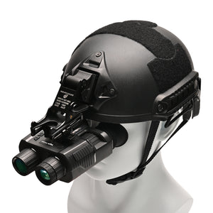 Black tactical helmet with night vision goggles on a white background night vision binoculars